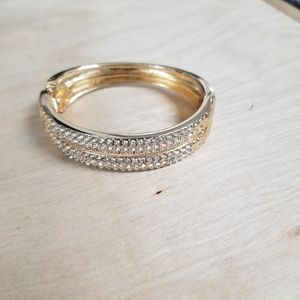 Gold tone bracelet 2 3/4" diameter